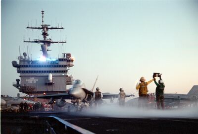 The crew of the 'USS Enterprise' prepare to launch a wave of air strikes against Iraq during Operation Desert Fox in 1998. US Navy
