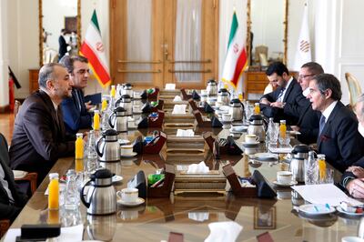 International Atomic Energy Organisation Director General Rafael Mariano Grossi, right, speaks with with Iran's Foreign Minister Hossein Amirabdollahian in Tehran on March 5, 2022. AP 