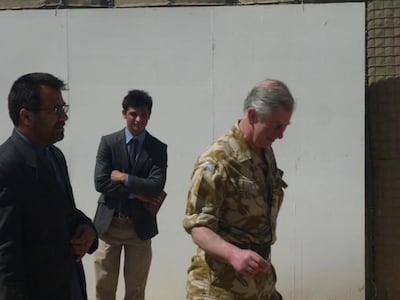 Nazir Ayeen, centre, worked as interpreter for Prince Charles in Afghanistan. Photo: Nazir Ayeen