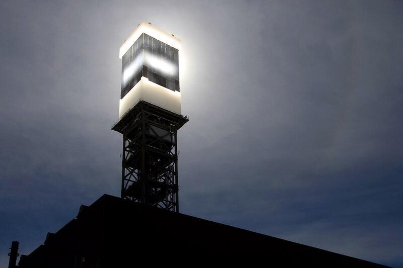 Concentrated solar power uses mirrors to heat a tower of salt, which can then produce energy for up to 12 hours. Ethan Miller / AFP