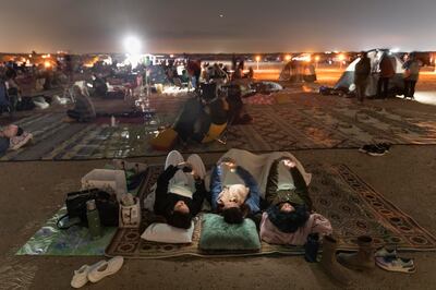 About 500 people gathered at Al Qudra desert to observe the Geminids meteor shower. Antonie Roberston / The National 
