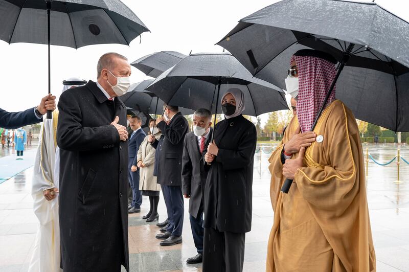 Sheikh Tahnoun bin Zayed, National Security Adviser, greets Mr Erdogan. Mohamed Al Hammadi / Ministry of Presidential Affairs
