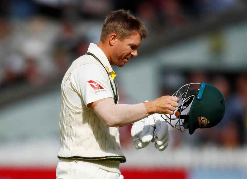Cricket - Ashes 2019 - Fourth Test - England v Australia - Emirates Old Trafford, Manchester, Britain - September 7, 2019   Australia's David Warner walks off dejected after losing his wicket      Action Images via Reuters/Jason Cairnduff