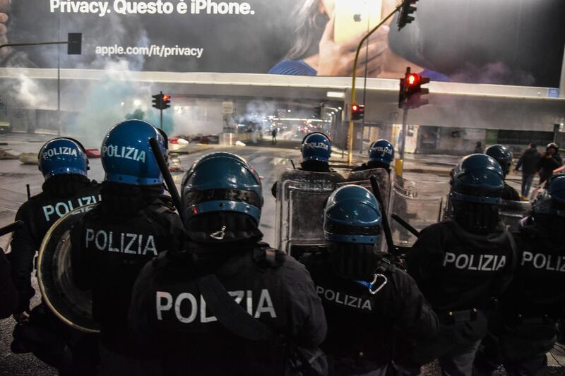 Clashes between demonstrators and police in Milan. EPA