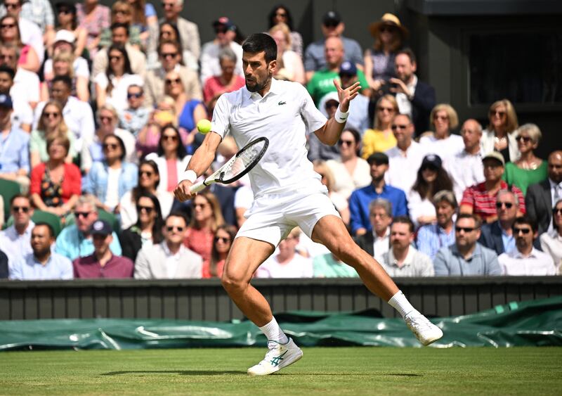 Serbia's Novak Djokovic plays a backhand return. Reuters
