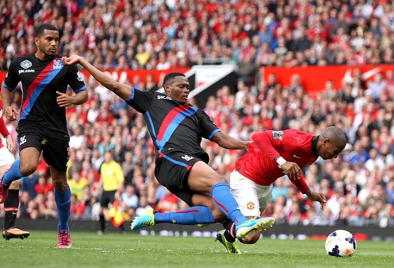 Manchester United’s Ashley Young, right, also went down in September’s Premier League game against Crystal Palace. Barrington Coombs / Empics