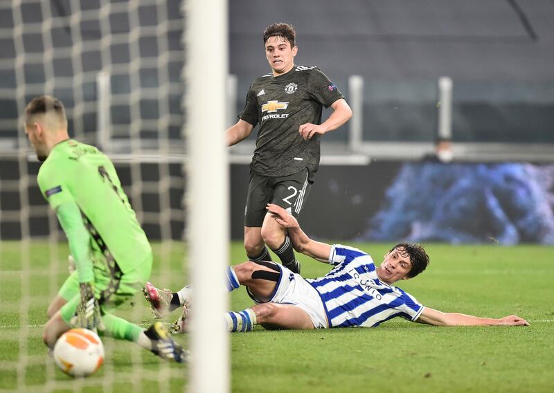 Manchester United's Daniel James scores their fourth goal. Reuters