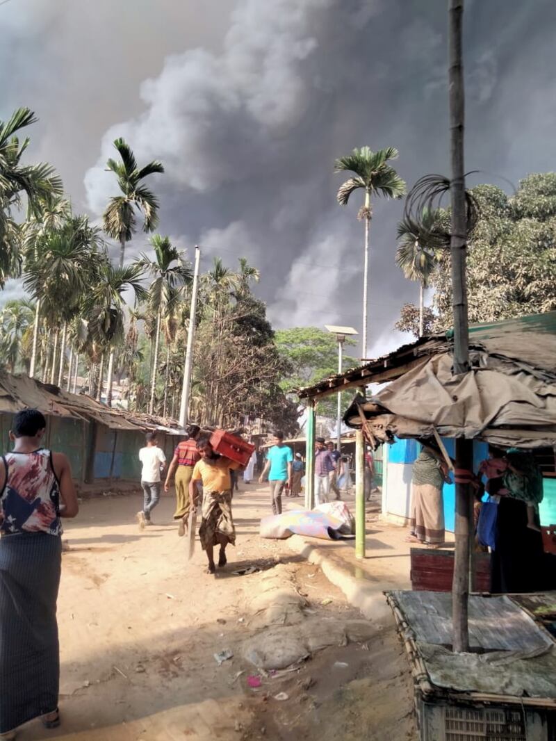 Smoke from a fire is seen at a Balukhali refugee camp in Cox's Bazar, Bangladesh. Reuters