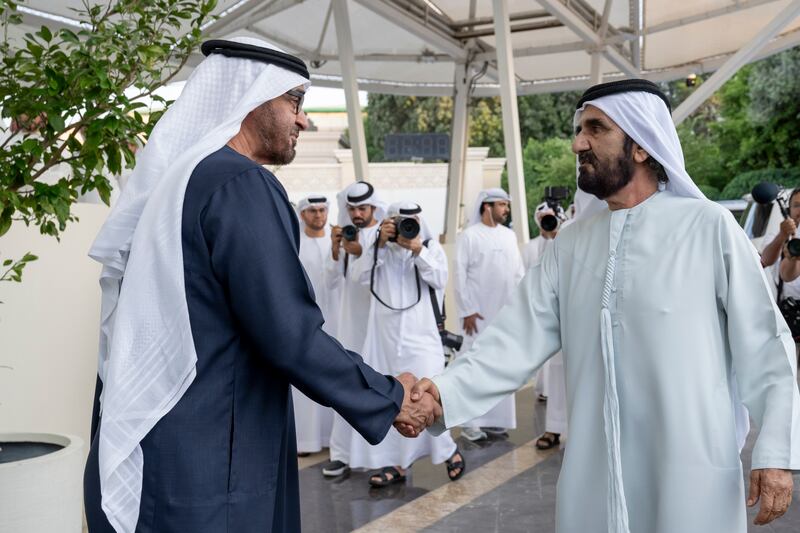 Sheikh Mohamed greets Sheikh Mohammed bin Rashid. Abdulla Al Neyadi / Presidential Court