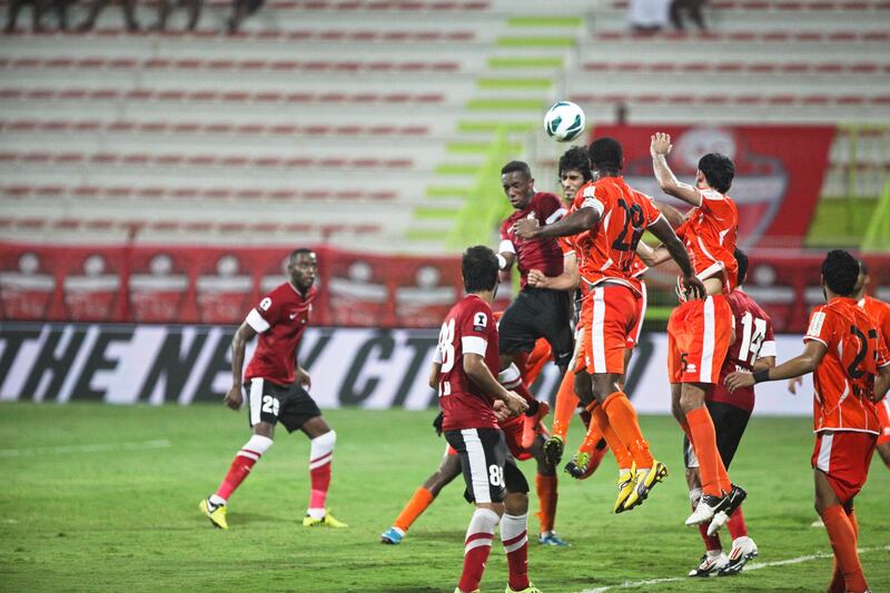 Dubai, UAE, October 14, 2012:

Dubai and Ajman faced off tonight in the Etisalat Cup. Ajaman , in the end, was victorious, 2-1, after a very sloppy first half. 

Players from both teams go up for the ball on a corner kick.

Lee Hoagland/The National