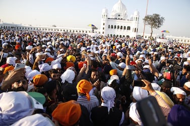 Sikh pilgrims at the shrine of Baba Guru Nanak at Gurduwara Darbar Sahib during the opening of the Kartarpur Corridor in Kartarpur, Pakistan on November 9. Sohail Shahzad / EPA