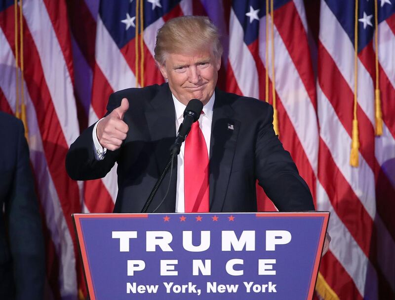NEW YORK, NY - NOVEMBER 09: Republican president-elect Donald Trump gives a thumbs up to the crowd during his acceptance speech at his election night event at the New York Hilton Midtown in the early morning hours of November 9, 2016 in New York City. Donald Trump defeated Democratic presidential nominee Hillary Clinton to become the 45th president of the United States.   Mark Wilson/Getty Images/AFP