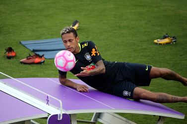 Neymar's camp insist the timing of his move to PSG meant Barcelona were obliged to pay him a loyalty bonus. Paulo Whitaker / Reuters