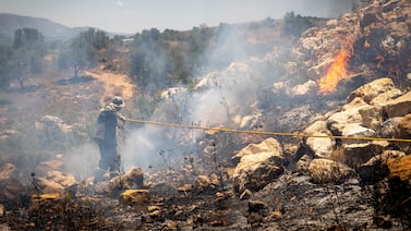 Once ignited, wildfires are also difficult to control, and spread easily, because rescue teams have a hard time reaching the location due to constant Israeli shelling. Matt Kynaston for The National.