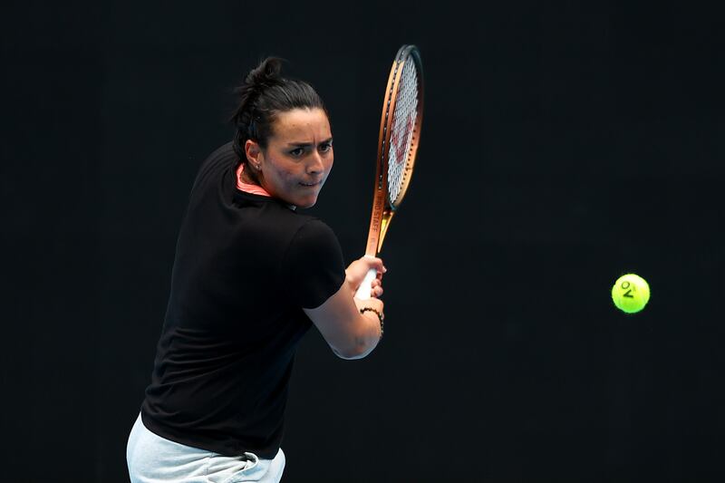 Ons Jabeur plays a backhand during a practice session at Melbourne Park. Getty