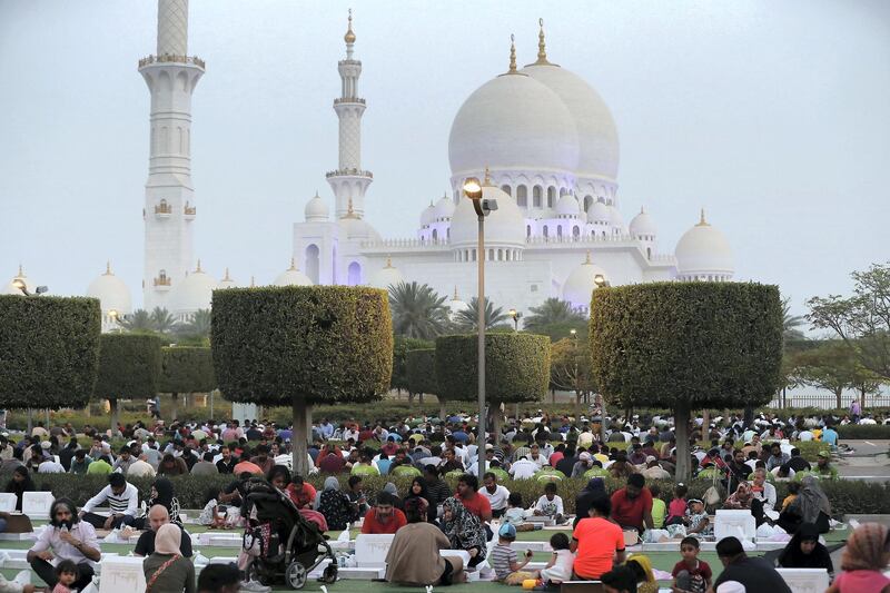 ABU DHABI,  UNITED ARAB EMIRATES , May 6 – 2019 :- People breaking their fast on the First day of Ramadan at the Sheikh Zayed Grand Mosque in Abu Dhabi. ( Pawan Singh / The National ) For News/Online/Big Picture/ Instagram