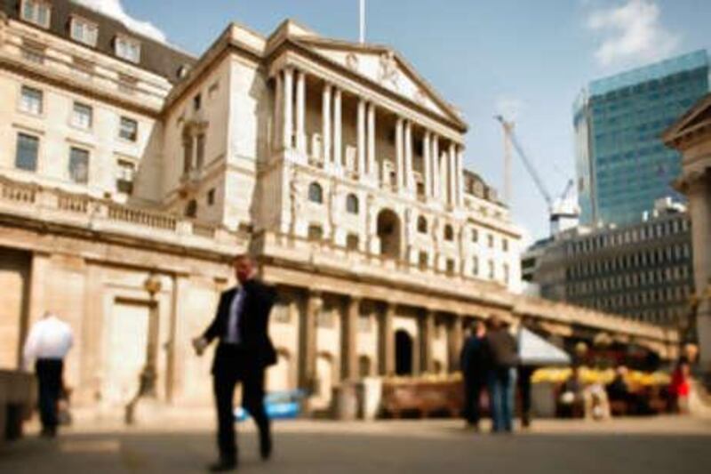 LONDON - APRIL 16:  (EDITORS NOTE: THIS IMAGE WAS CREATED USING A VARIABLE PLANED LENS). The Bank of England dominates Threadneedle Street on April 16, 2008 in London. The United Kingdom's financial outlook still looks gloomy - with house prices continuing to fall even after interest rates were reduced to 5%.  (Photo by Peter Macdiarmid/Getty Images)