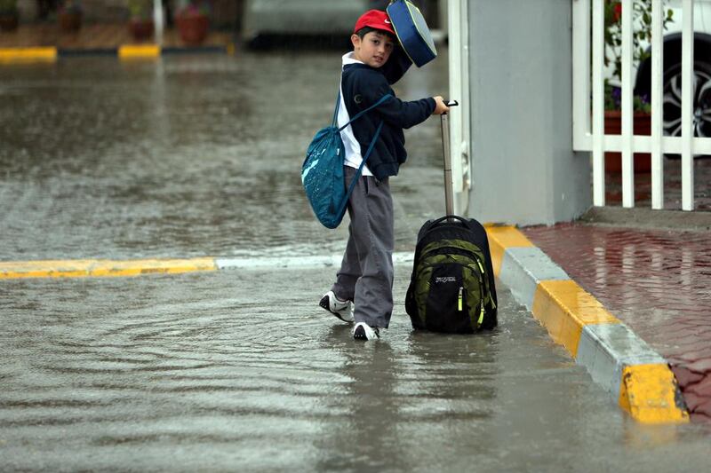 Heavy rain swept over Abu Dhabi Thursday morning as commuters went to work and school. Sammy Dallal / The National 



