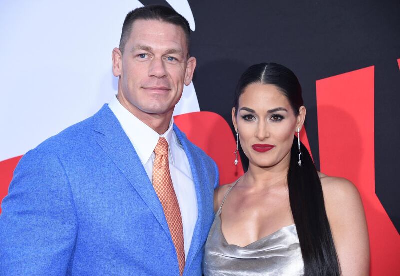 Cast member John Cena (L) and Nikki Bella attend the premiere of "Blockers" in Los Angeles, California, U.S. April 3, 2018. REUTERS/Phil McCarten