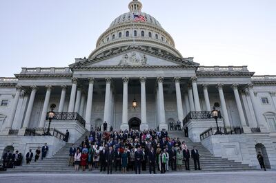 FILE PHOTO: Members of Congress observe a moment of silence for the 600,000 American lives lost to the coronavirus disease (COVID-19), outside the U.S. Capitol in Washington, U.S., June 14, 2021. REUTERS/Evelyn Hockstein/File Photo