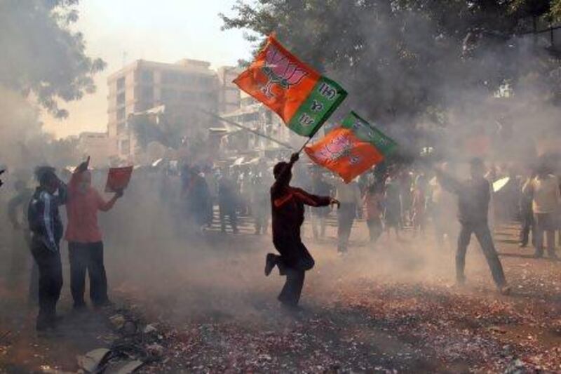 Supporters of the Bharatiya Janta Party (BJP) celebrate Gujarat’s chief minister Narendra Modi's win.