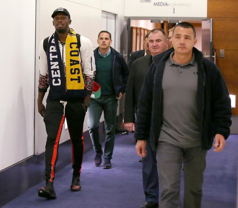 Usain Bolt arrives in Sydney. AP Photo