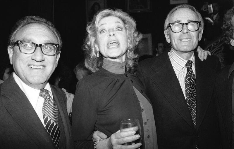 Lauren Bacall with Henry Kissinger and actor Henry Fonda at a party to launch her autobiography, By Myself at the Palace Theater in New York. AP