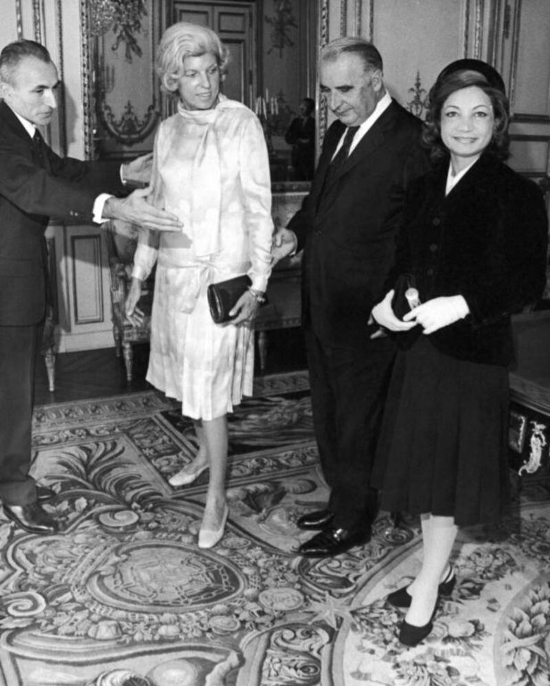 From left, chief of Elysee Palace Protocol Jacques Senard, Claude Pompidou, French president Georges Pompidou and princess Ashraf Pahlavi at the Elysee Palace in Paris. AP Photo