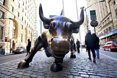 A bull statue stands in the Financial District near the New York Stock Exchange in New York, U.S. Daniel Acker / Bloomberg News