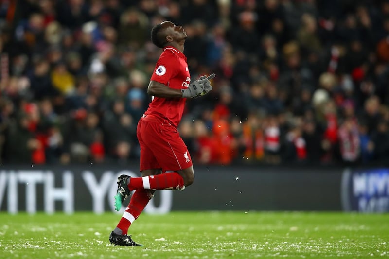 LIVERPOOL, ENGLAND - JANUARY 30:  Sadio Mane of Liverpool celebrates after scoring his team's first goal during the Premier League match between Liverpool FC and Leicester City at Anfield on January 30, 2019 in Liverpool, United Kingdom.  (Photo by Clive Brunskill/Getty Images)