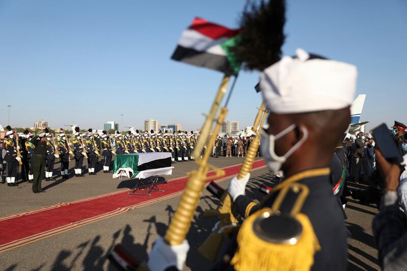 Body of former Sudan's prime minster Sadiq al-Mahdi arrives to Khartoum, Sudan, Friday, Nov. 27, 2020. Al-Mahdi, Sudan's last democratically elected prime minister and leader of the country's largest political party, has died of COVID-19 in a hospital in the United Arab Emirates (AP Photo / Marwan Ali)