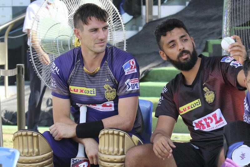 Pat Cummins of Kolkata Knight Riders and Varun Chakaravarthy of Kolkata Knight Riders during match 35 of season 13 of the Dream 11 Indian Premier League (IPL) between the Sunrisers Hyderabad and the Kolkata Knight Riders at the Sheikh Zayed Stadium, Abu Dhabi  in the United Arab Emirates on the 18th October 2020.  Photo by: Rahul Goyal  / Sportzpics for BCCI