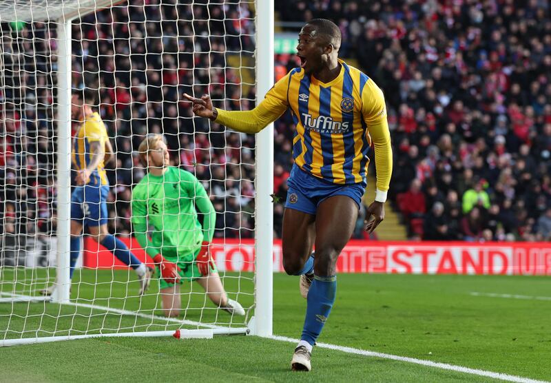 Shrewsbury Town's Daniel Udoh celebrates scoring. Reuters