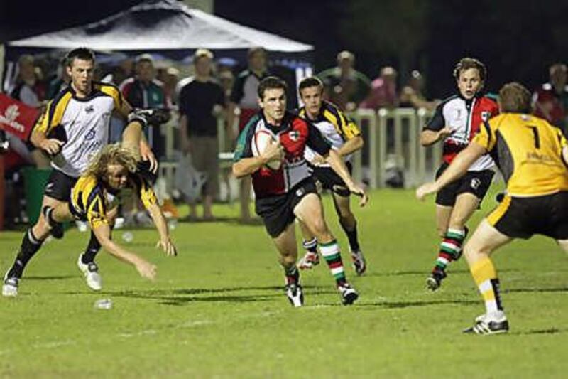 The Abu Dhabi Harlequins, with ball, will play their running game on a pitch at Zayed Sports City next season.