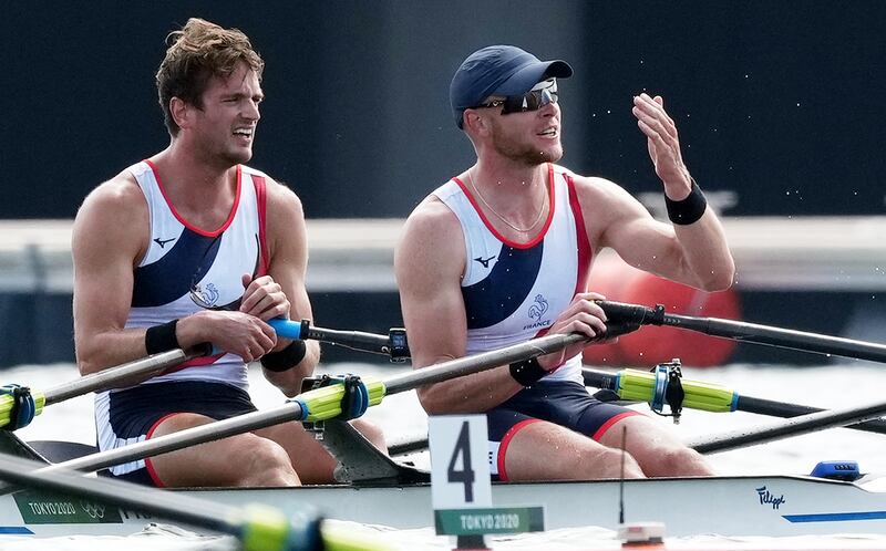 Hugo Boucheron (L) and Matthieu Androdias of France celebrate winning the Men's Doubles Sculls.