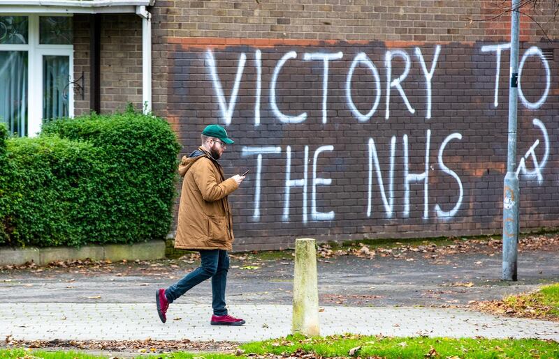 Graffiti supporting the National Health Service in the Bogside area of Derry, Northern Ireland. Bloomberg