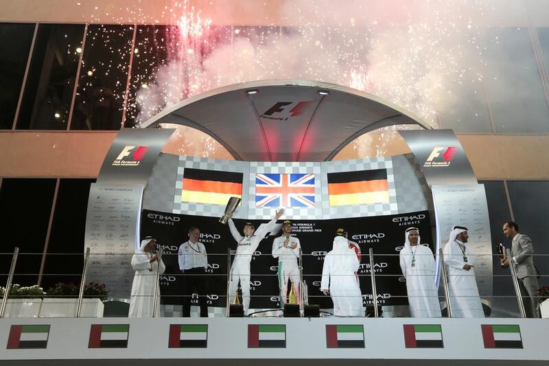 Nico Rosberg of Germany and Mercedes-GP celebrates placing second and clinching the world championship. Christopher Pike / The National