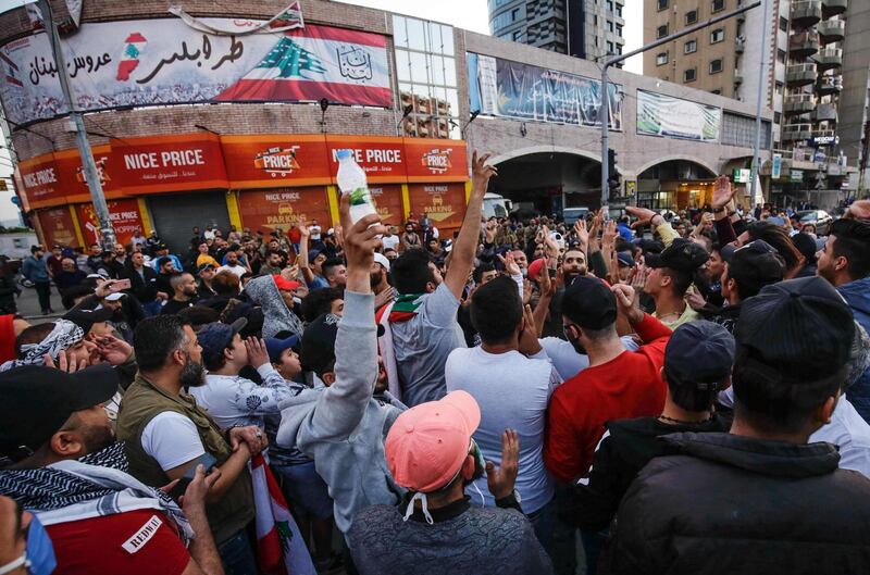 Several hundred Lebanese people protest in the northern city of Tripoli on April 17, 2020 despite the country's coronavirus lockdown. AFP