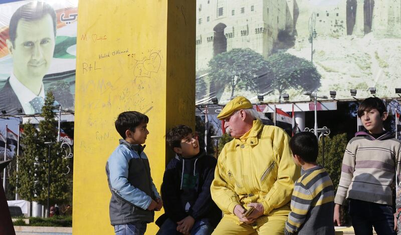 Zakkour chats with children in the central square