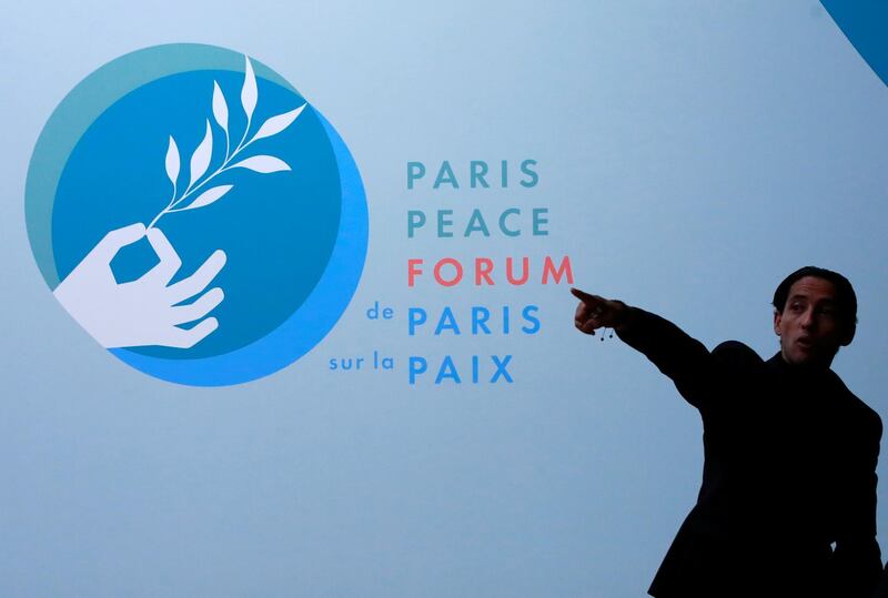 A steward reacts the Paris Peace Forum in Paris, France, November 12, 2018. REUTERS/Gonzalo Fuentes