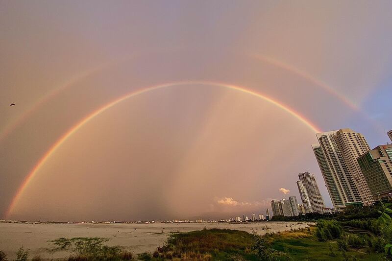 A rainbow is seen over the coastline of Penang, Malaysia. AFP