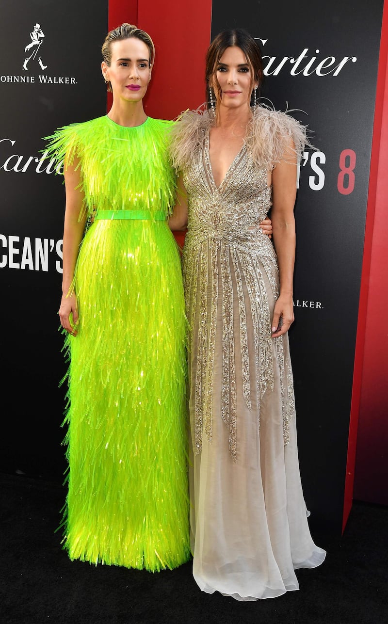 Sarah Paulson's fluorescent green fringe Prada gown has to be our favourite of the night, while Sandra Bullock opted to wear a design by Lebanese genius Elie Saab (Spring 2018 Haute Couture to be exact). AFP