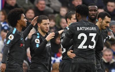 epa06457444 Chelsea's Eden Hazard (2-L) celebrates with team mates after scoring his second goal during the English Premier League soccer match between Brighton and Hove Albion FC and Chelsea FC in Brighton, Britain, 20 January 2018.  EPA/ANDY RAIN EDITORIAL USE ONLY. No use with unauthorized audio, video, data, fixture lists, club/league logos or 'live' services. Online in-match use limited to 75 images, no video emulation. No use in betting, games or single club/league/player publications.