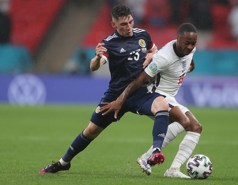 Scotland's Billy Gilmour, left, and England's Phil Foden vie for the ball during the Euro 2020 soccer championship group D match between England and Scotland at Wembley stadium in London, Friday, June 18, 2021. (Carl Recine/Pool Photo via AP)