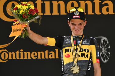 Team Jumbo Visma's Sepp Kuss of US celebrates on the podium at the end of the 15th stage of the 108th edition of the Tour de France cycling race, 191 km between Ceret and Andorre-La-Vieille, on July 11, 2021.  (Photo by Philippe LOPEZ  /  AFP)