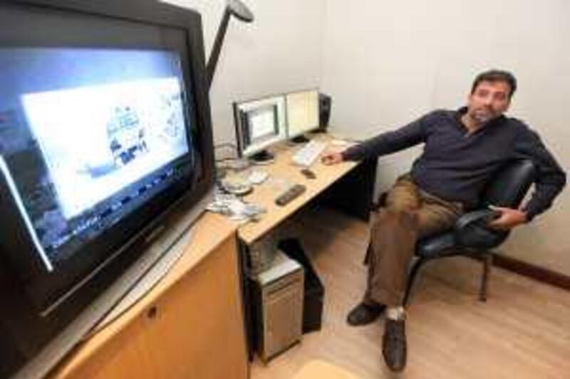 Egyptian director Khaled Youssef edits his most recent motion picture at his film company in Cairo on December 6, 2009. Victoria Hazou *** Local Caption ***  VH_NasserFilm.004.JPG VH_NasserFilm.004.JPG