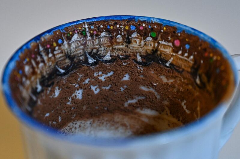 A painted Turkish coffee cup by Turkey's micro artist Hasan Kale