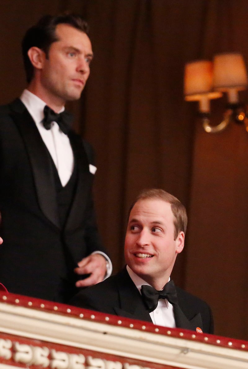 Prince William is joined by actor Jude Law in the Royal Box at the Winter Whites Gala, in aid of the homelessness charity Centrepoint, at the Royal Hall on December 8, 2012 in London. WPA Pool/Getty Images