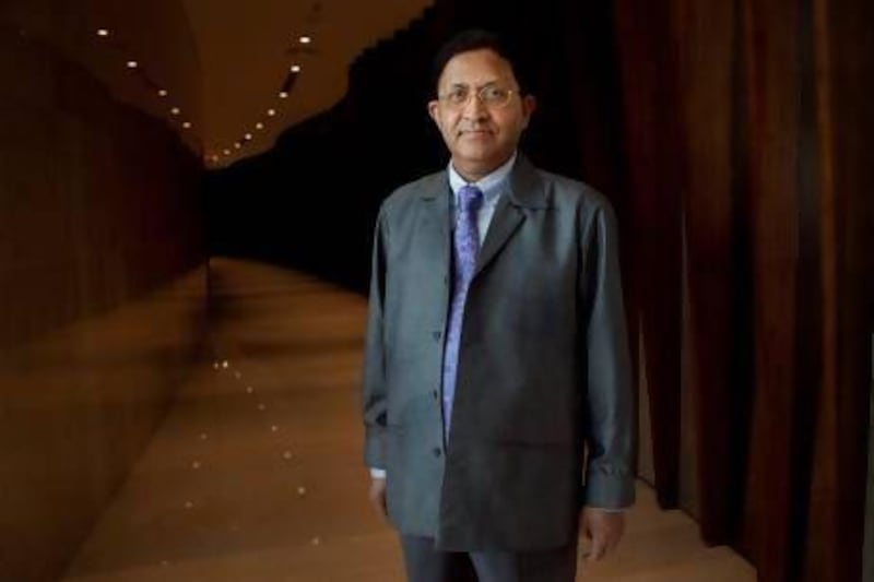 The retail academic Nitin Sanghavi poses for a portrait at the Crowne Plaza in Festival City. Jaime Puebla / The National