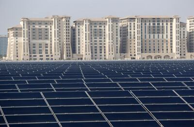 A solar farm on the outskirts of Masdar City, Abu Dhabi. Karim Sahib / AFP
